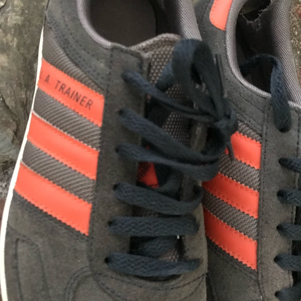 Adidas mens sneaker. Grey with burnt orange strips